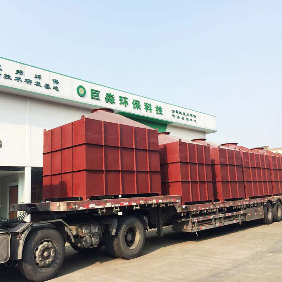 巨淼工廠生產的廢氣吸附塔運輸中.jpg